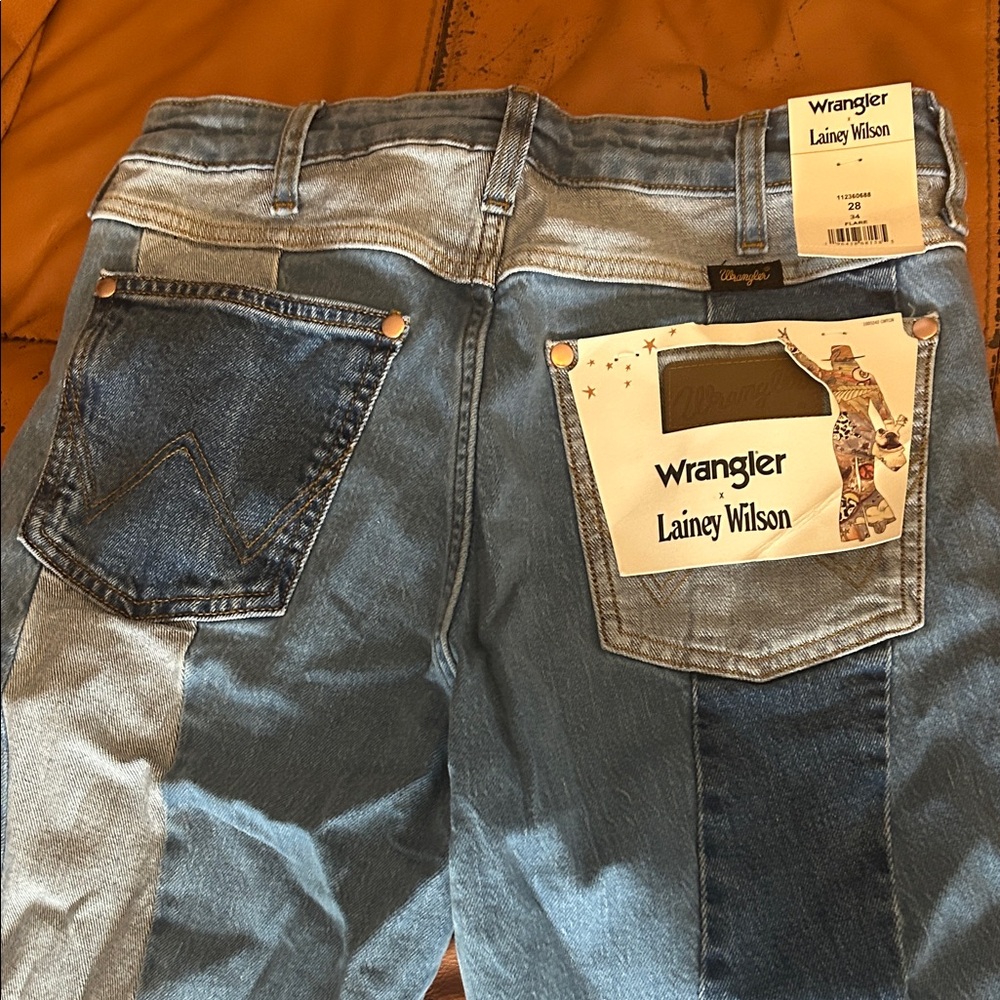 Wrangler women’s Lainey Wilson Two-Tone Blue Bootcut Jeans